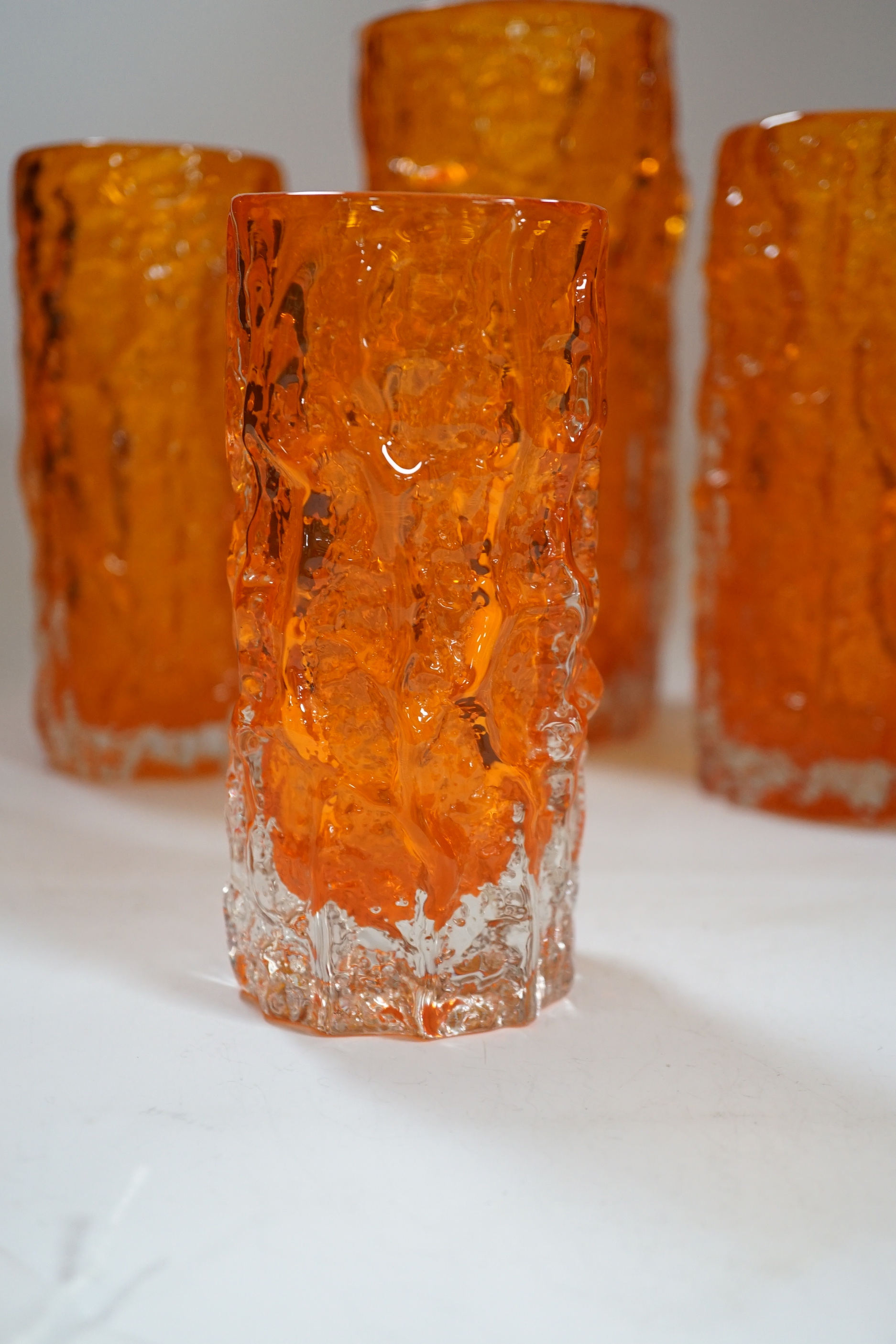 A pair and two other Whitefriars ‘bark’ vases in tangerine, tallest 24cm